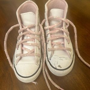 Gently worn panda Converse sneakers